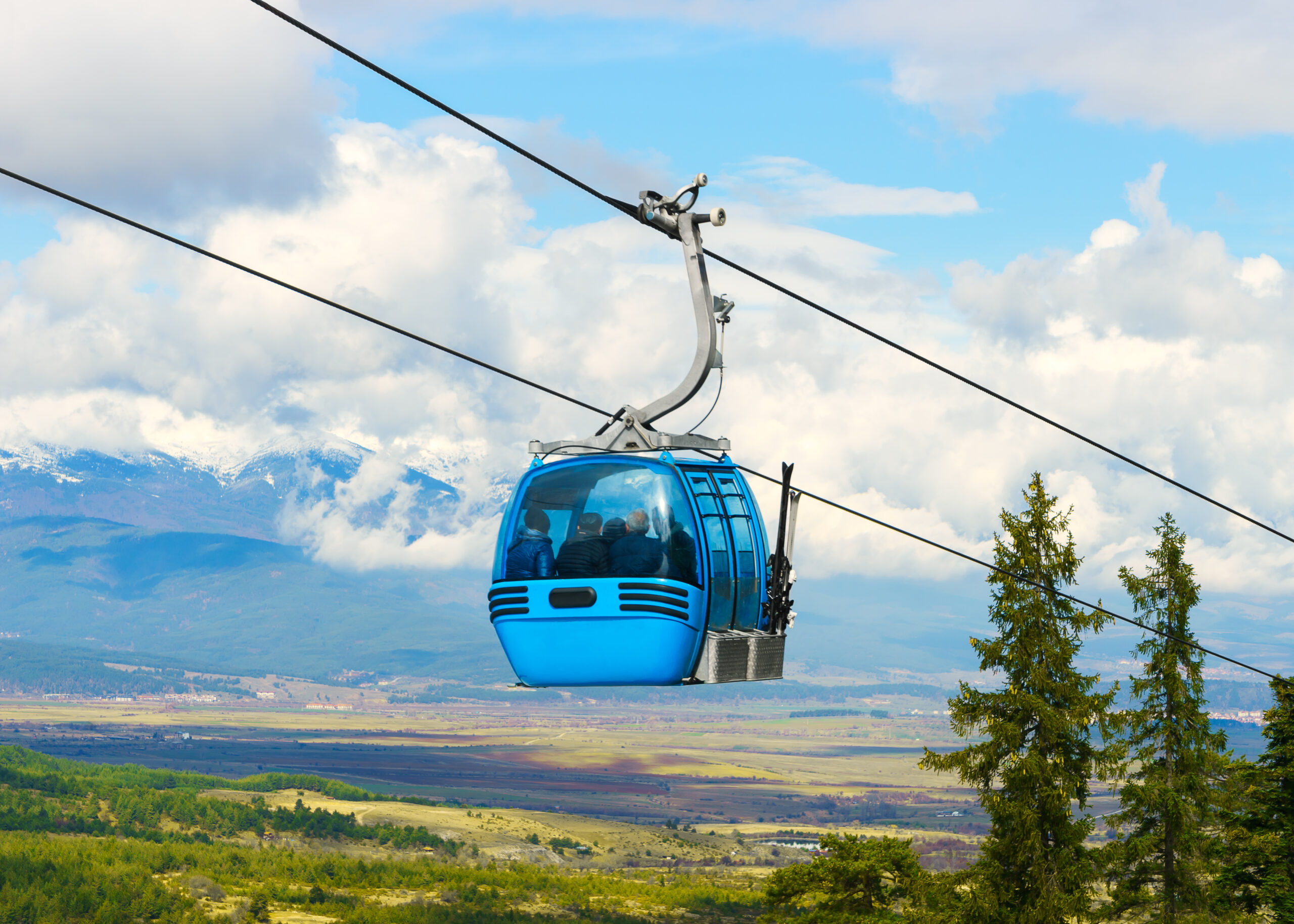 Mountain landscape in a ski resort with a cable car to the mountains.